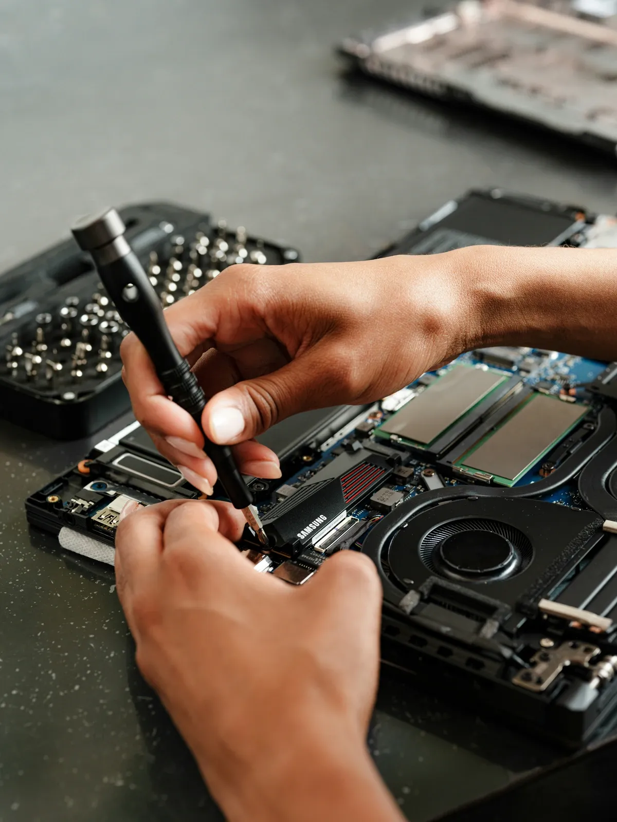 Technician servicing computer hardware